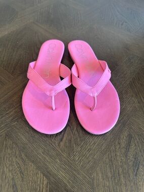 Calvin Klein pink flip flops size 10